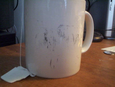 Faded image on Tufts mug